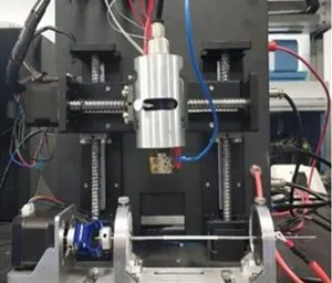 A machine manufacturing another machine, showcasing the process of automated production.