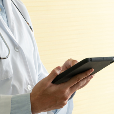 Doctor accessing secure electronic health record system on tablet