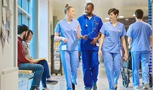 Healthcare staff receiving infection control training in hospital setting